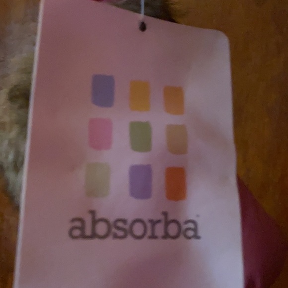 Absorbs slightly hot pink snowsuit. Great a cold weather day. - Picture 8 of 9